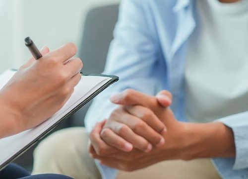 Doctor conducting a health screening with a patient in Fullerton, CA doctors office